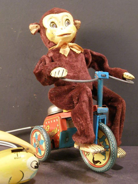 A Monkey Rides a Tricycle